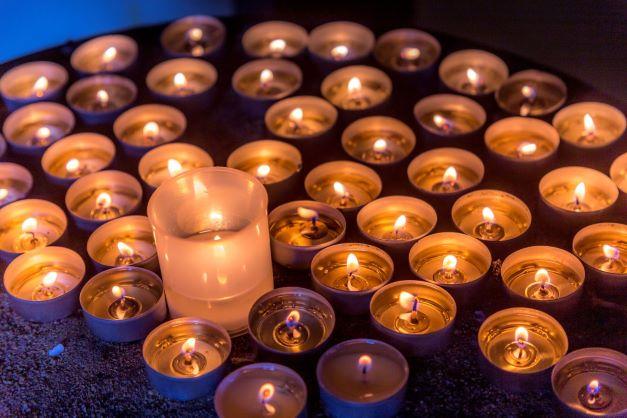 lit votive candles